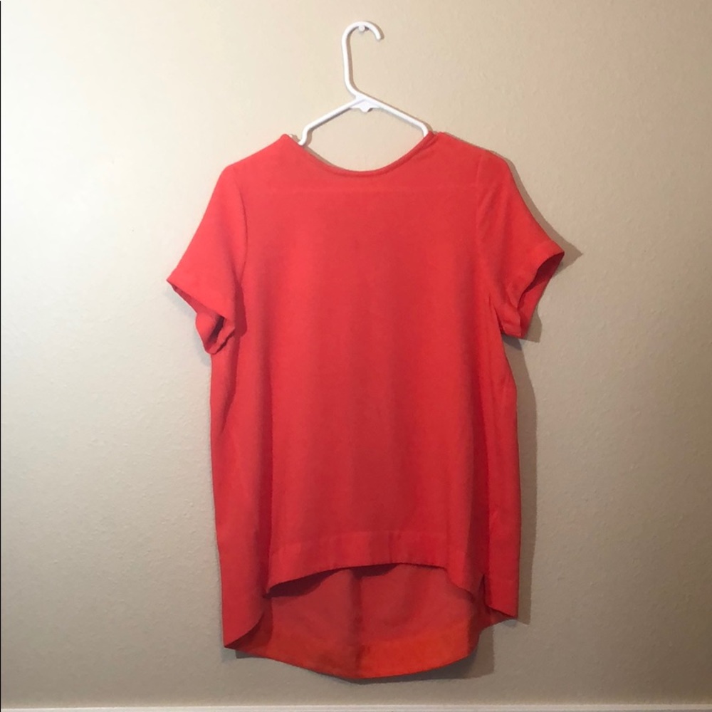 Orange high low blouse